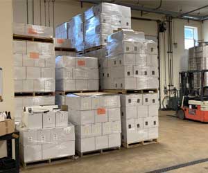 Stacks of Winter's Hill Estate Pinot noir in boxes after a day of bottling.